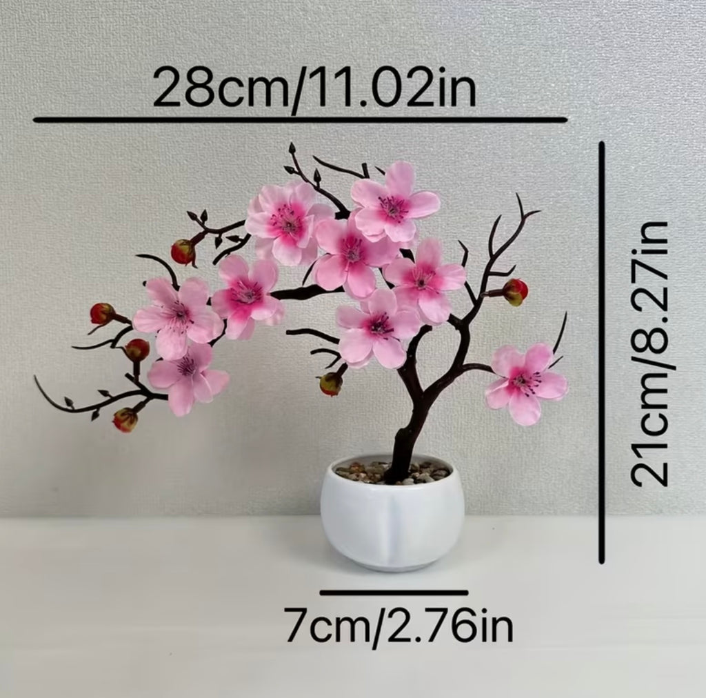 A set of potted plants with artificial plum blossoms