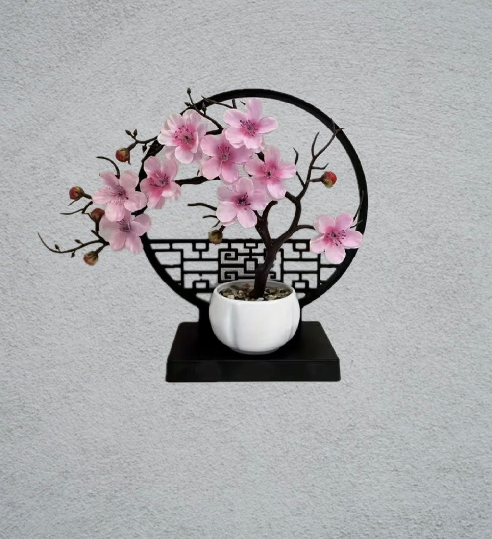 A set of potted plants with artificial plum blossoms