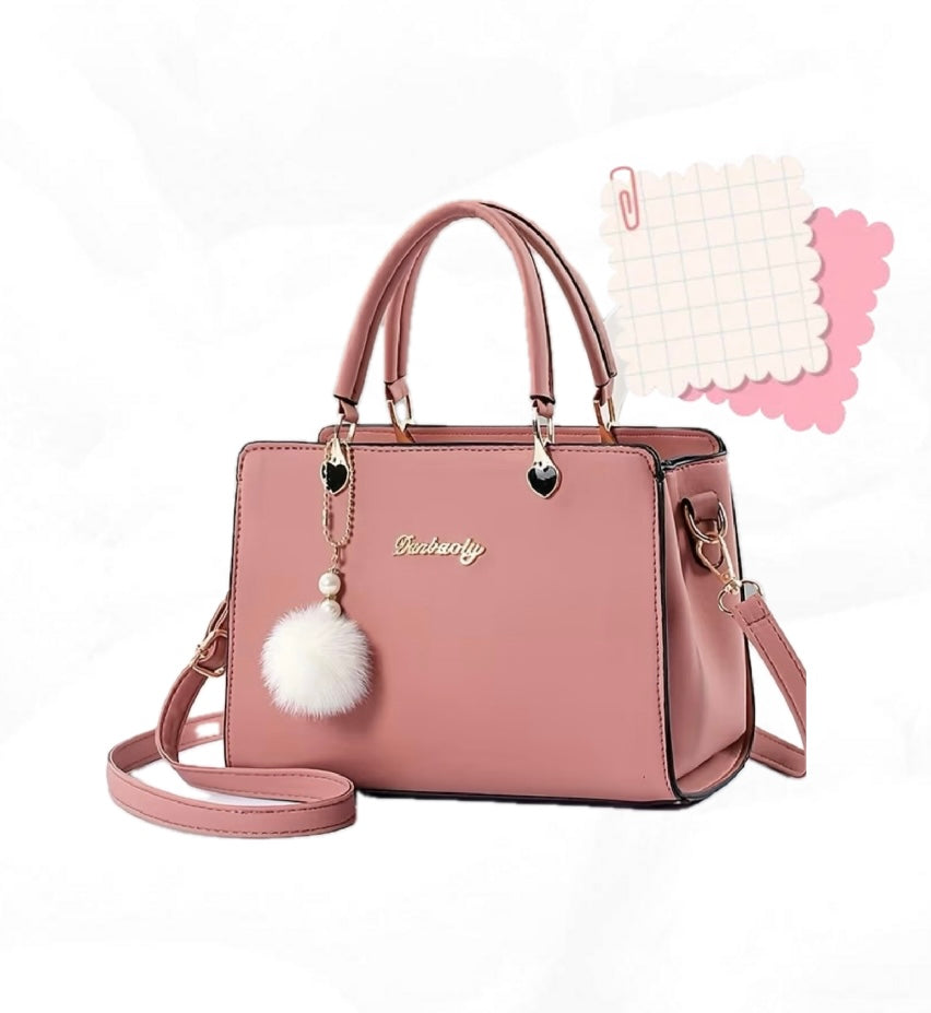 Bolso de moda con pompón decorativo