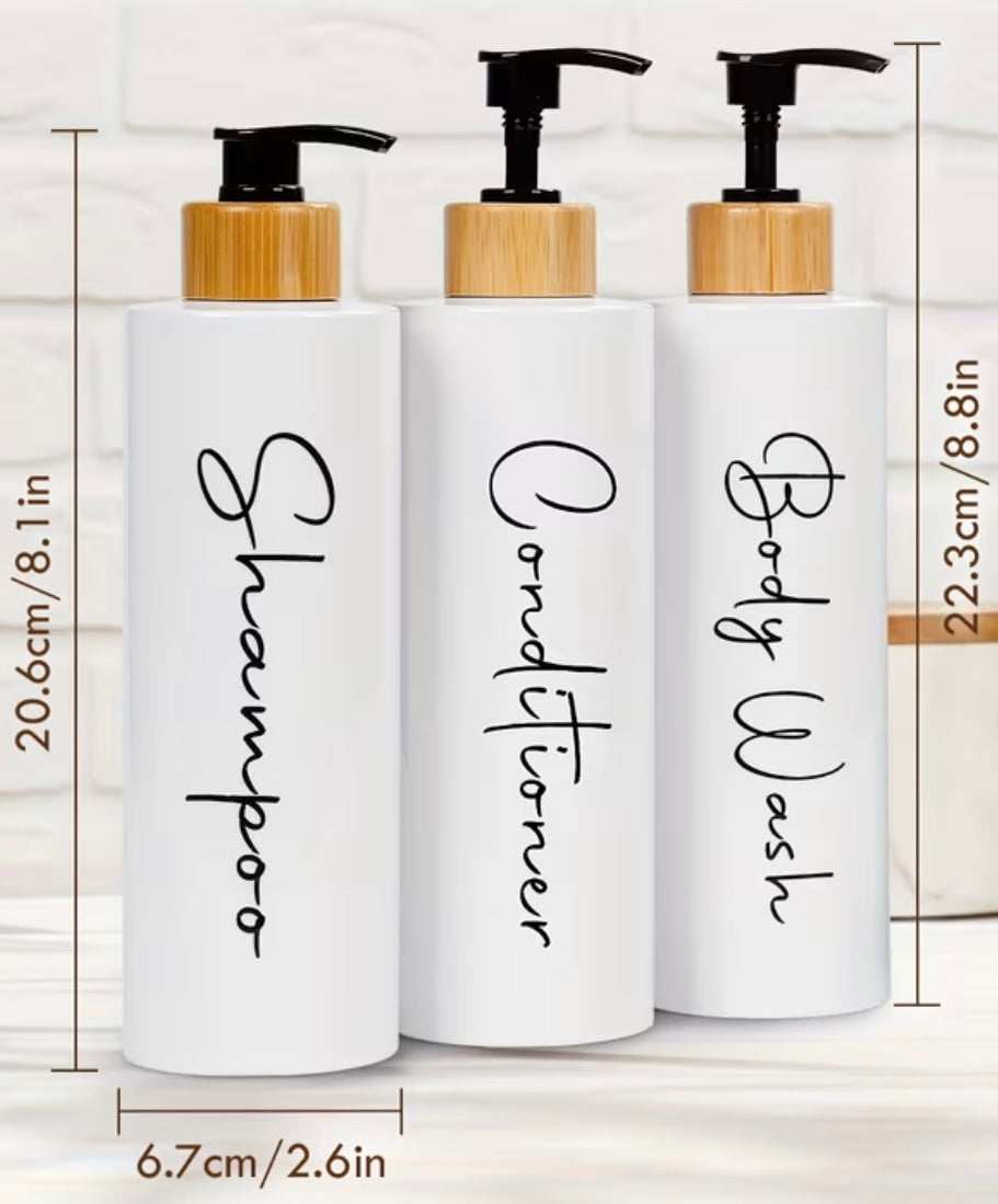 3 dispensers for shampoo, conditioner and black and white soap