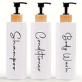3 dispensers for shampoo, conditioner and black and white soap