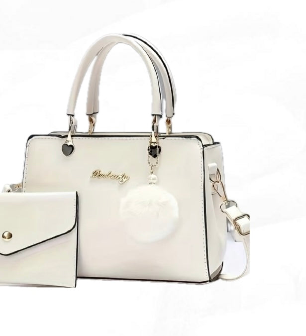 Bolso de moda con pompón decorativo