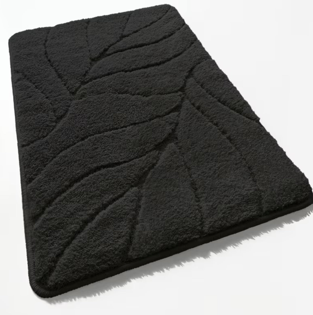 Plush bath mat with non-slip back