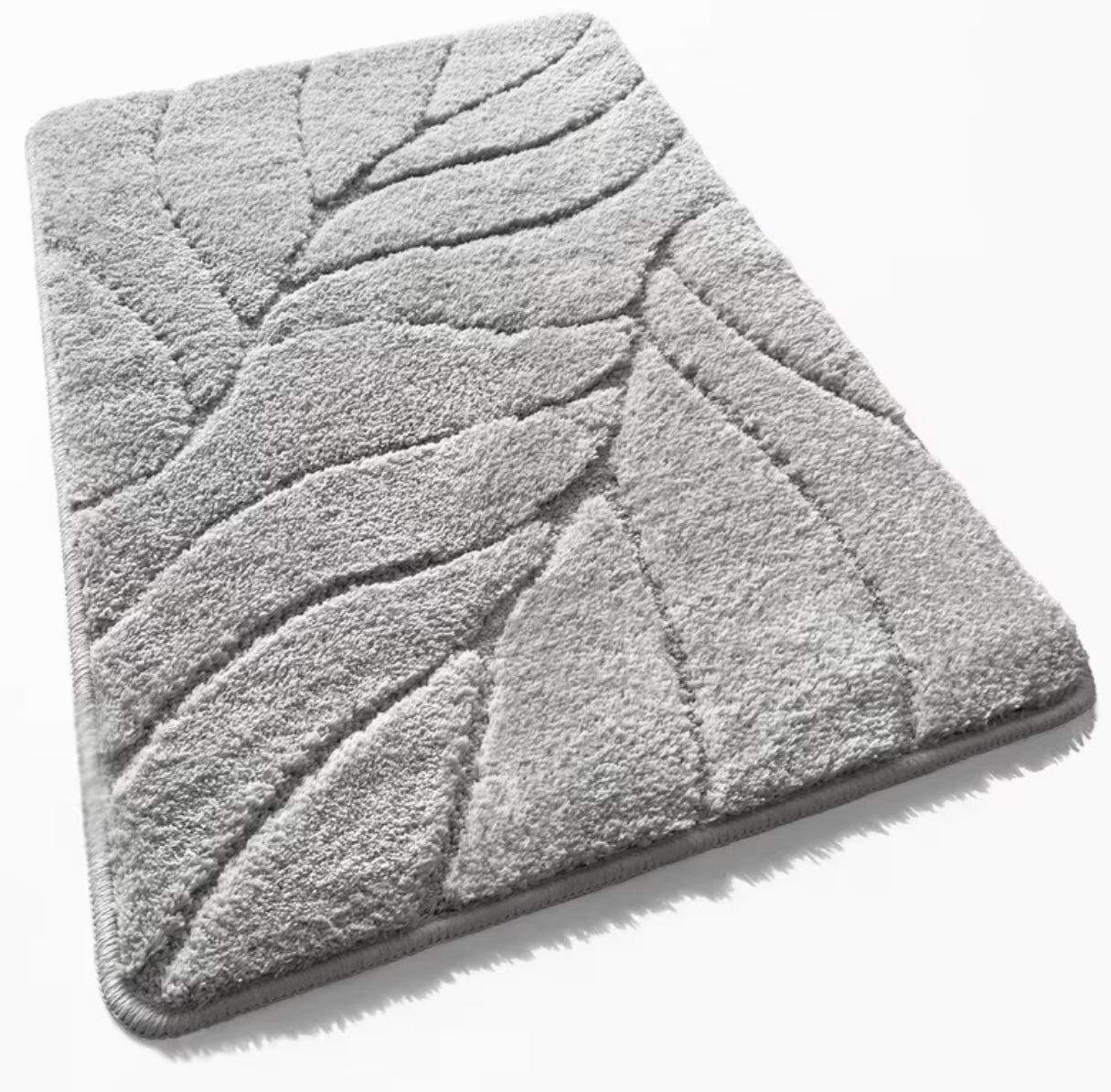 Plush bath mat with non-slip back