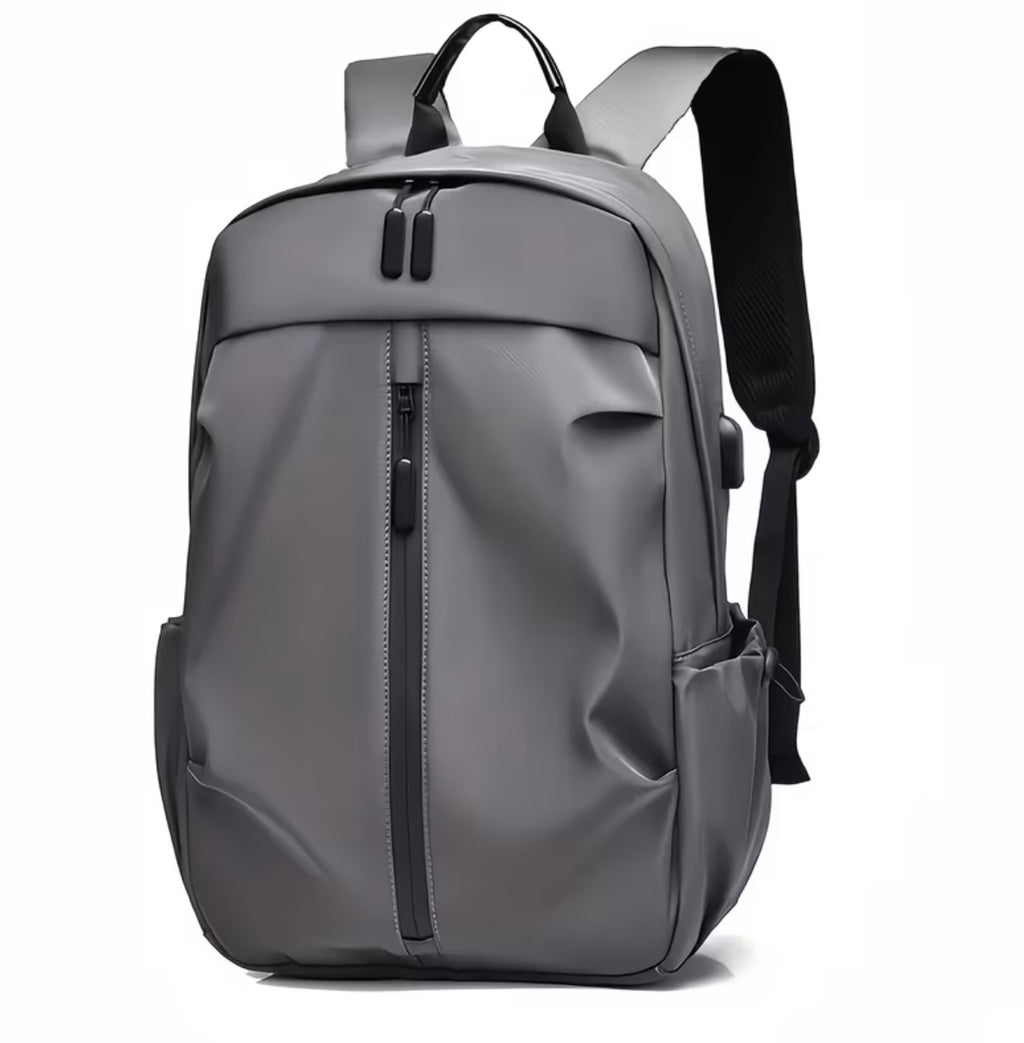 Fashionable unisex backpack in solid colour