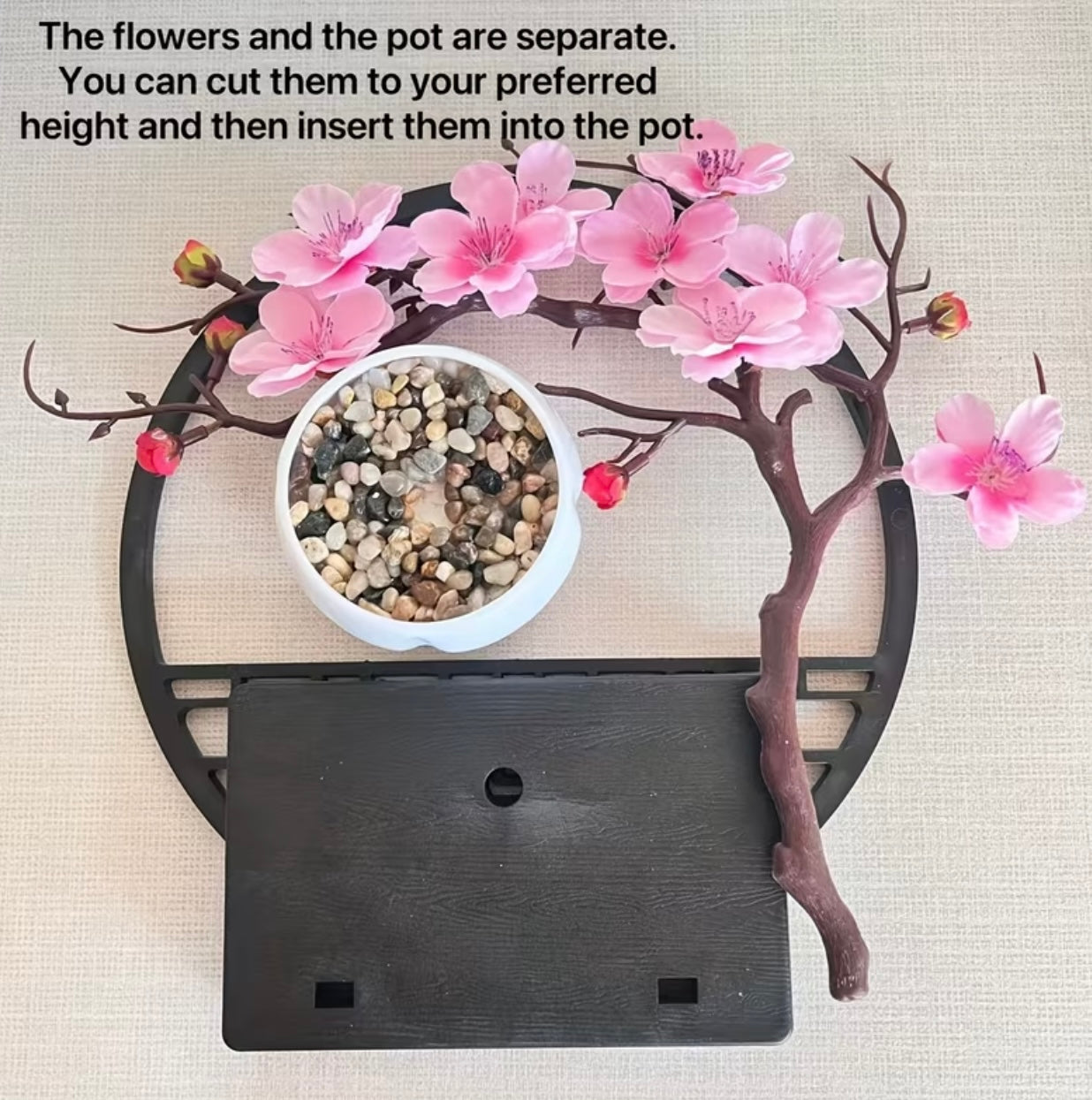 A set of potted plants with artificial plum blossoms