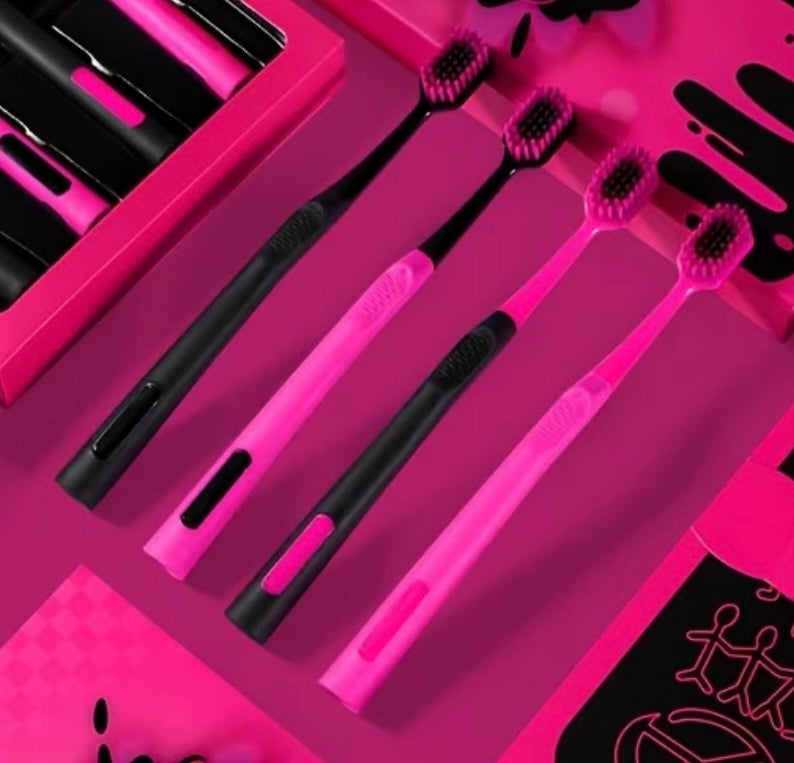 Serie di spazzolini da denti neri e rosa con graffiti, set da 4 pezzi
