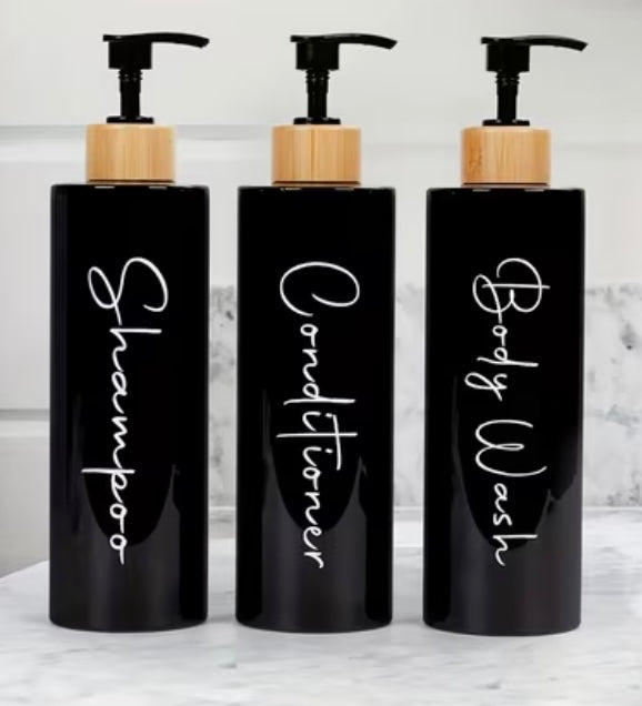3 dispensers for shampoo, conditioner and black and white soap