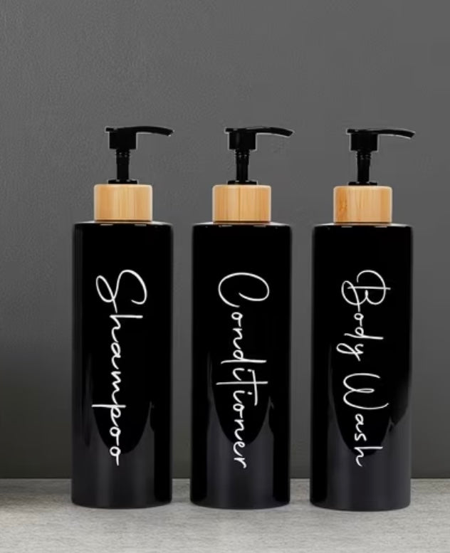 3 dispensers for shampoo, conditioner and black and white soap